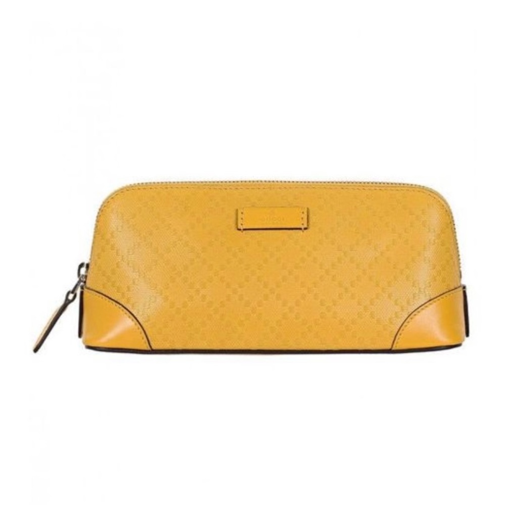 Gucci women’s cosmetic yellow leather case